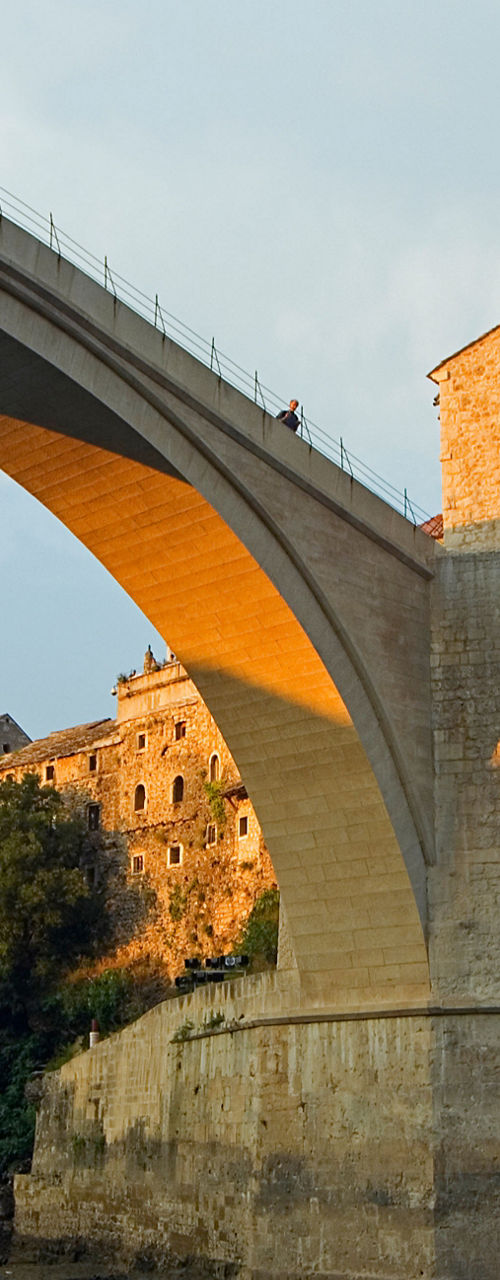 Historic stone bridge over scenic river