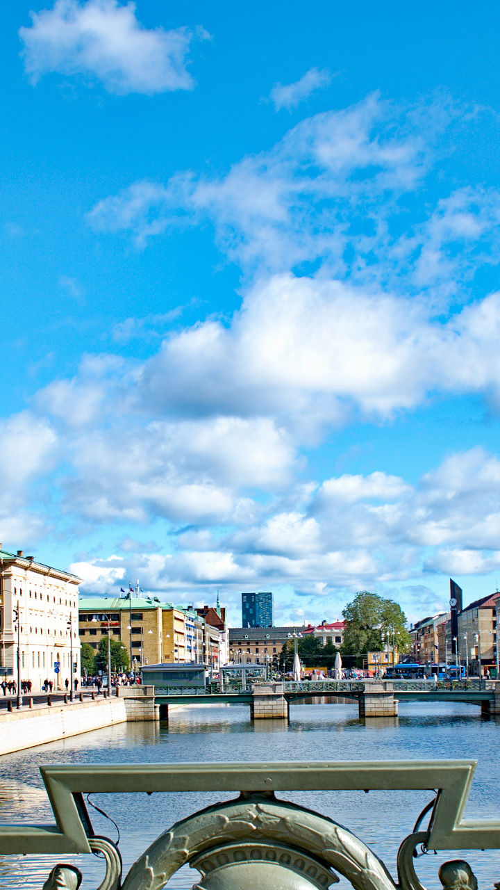 Historic cityscape with canal and bridge