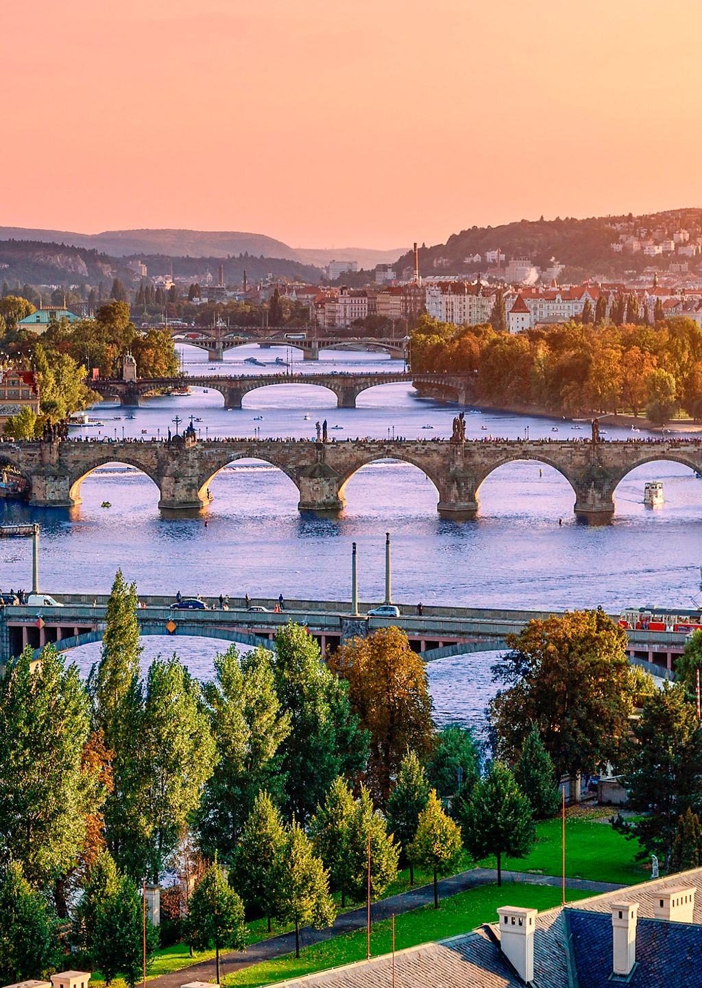 Sunset view over historic city bridges