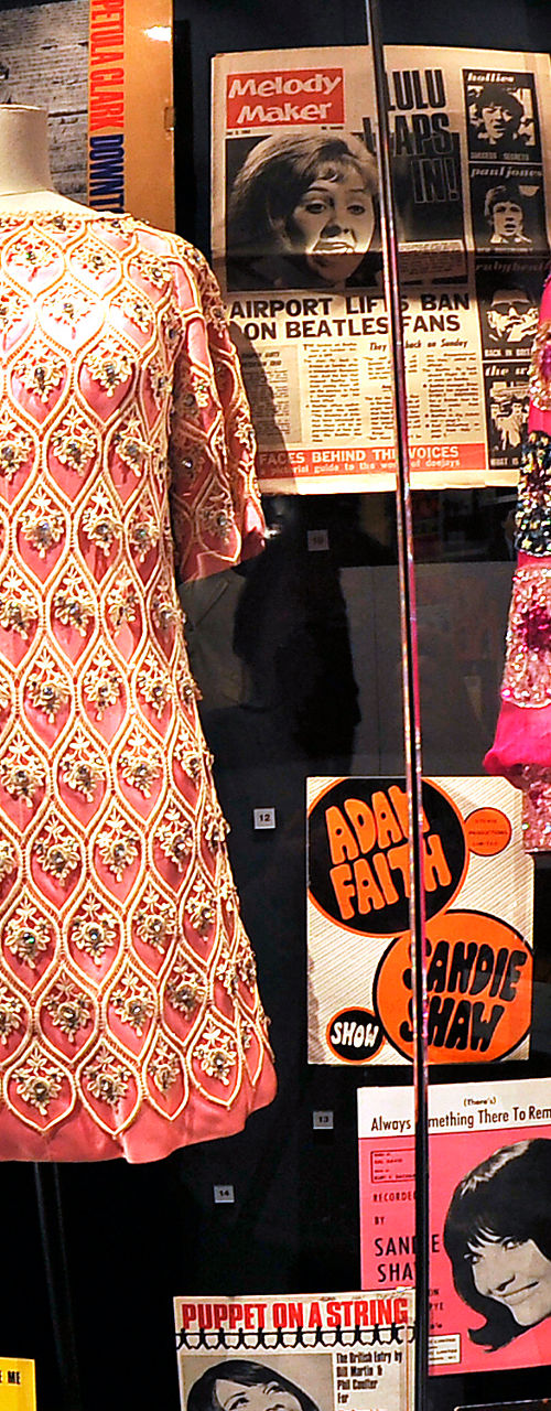 Vintage Fashion Exhibit with Colorful Dresses