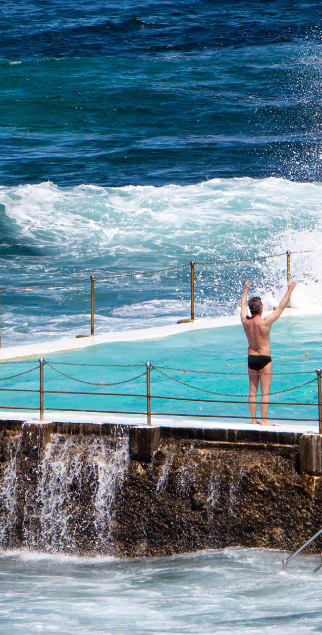 Ocean pool with waves splashing nearby