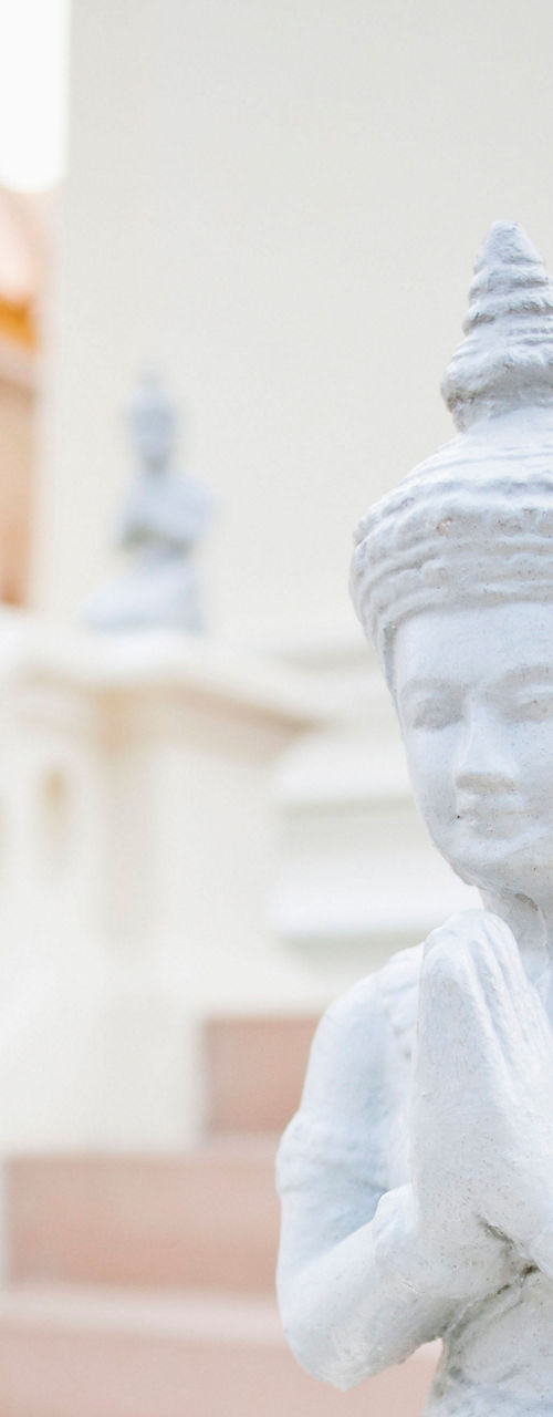 White statue in traditional Thai temple
