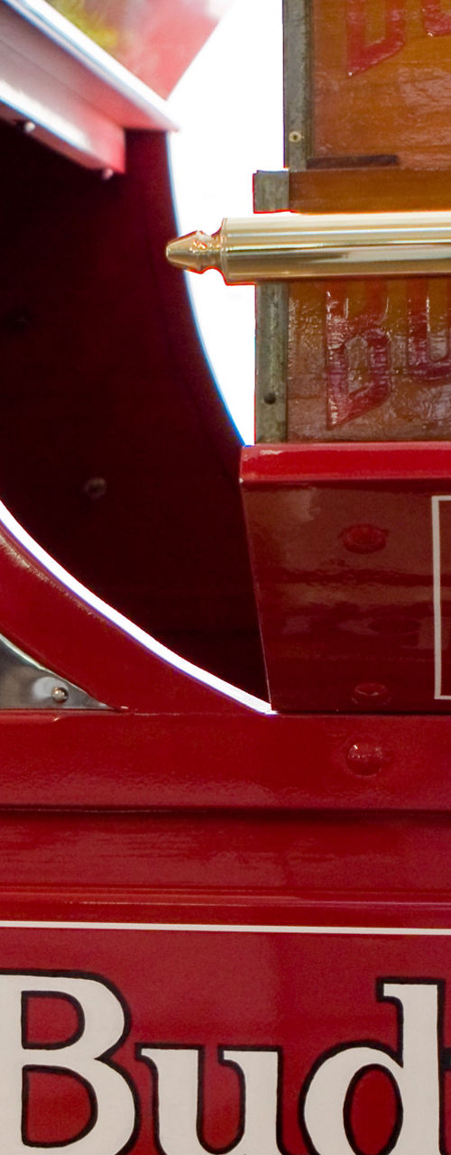 Budweiser red carriage with gold emblem