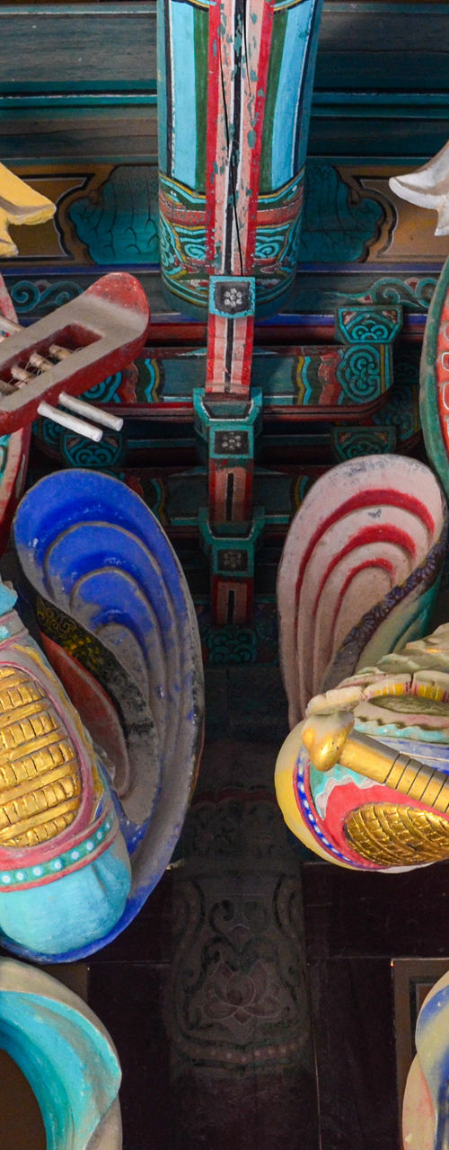 Colorful guardian statues in traditional temple