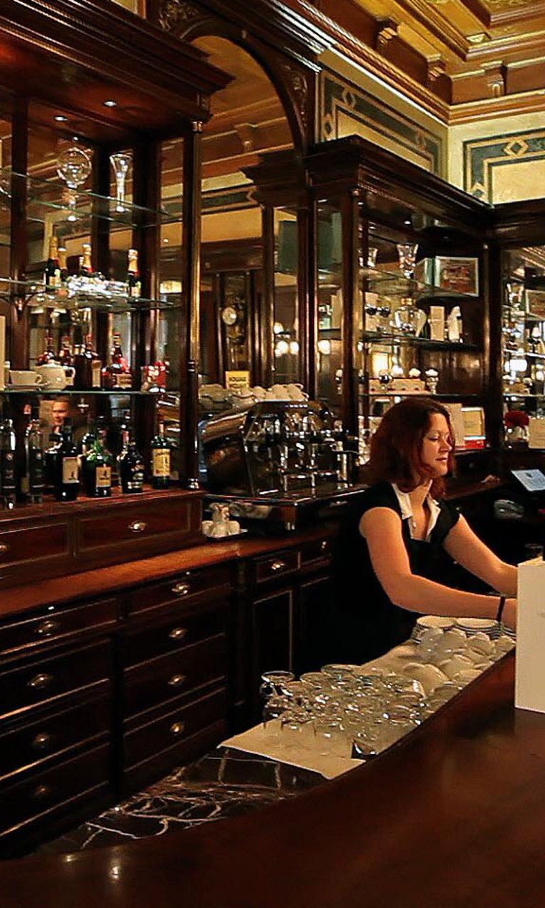 Elegant bar interior with patrons seated