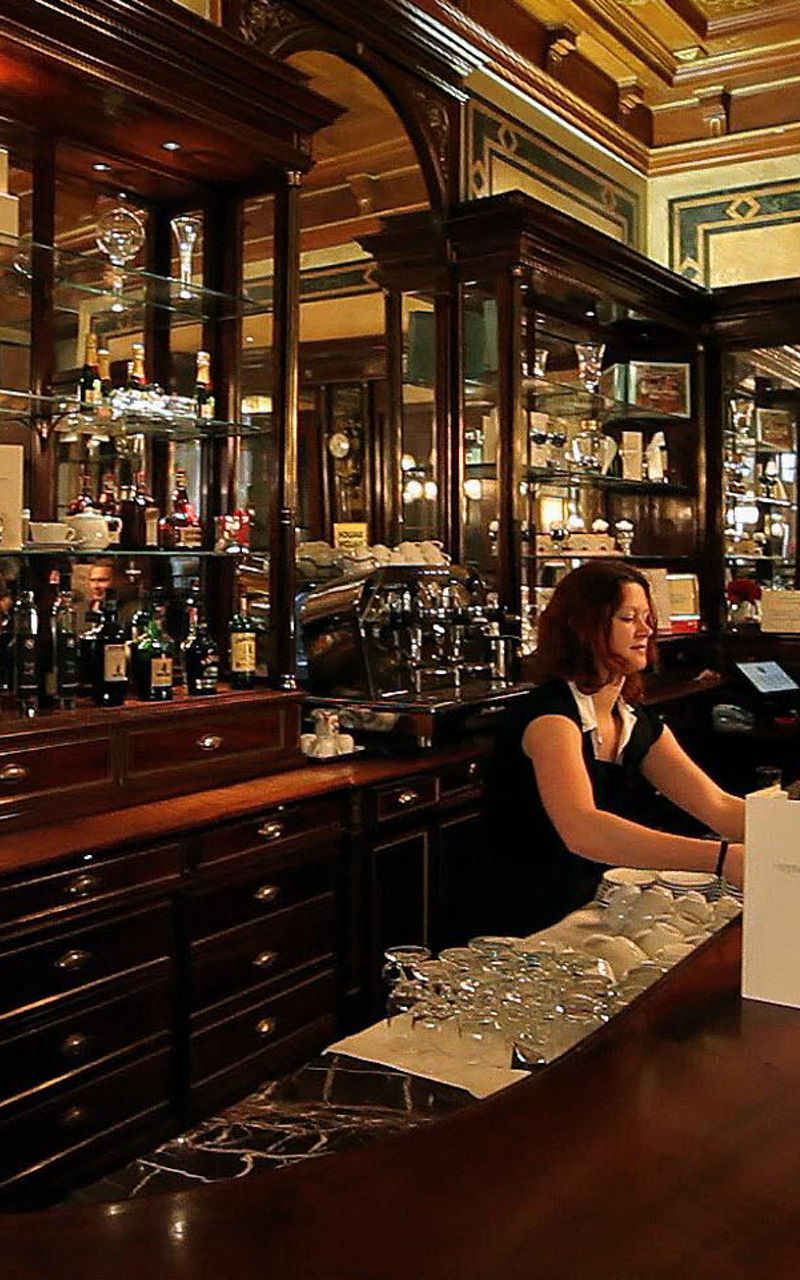 Elegant bar interior with patrons seated