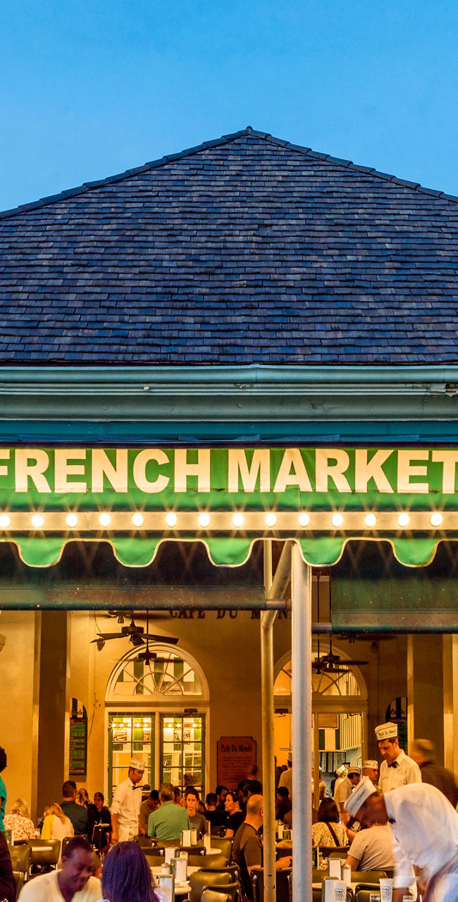 Original French Market Coffee Stand bustling at dusk