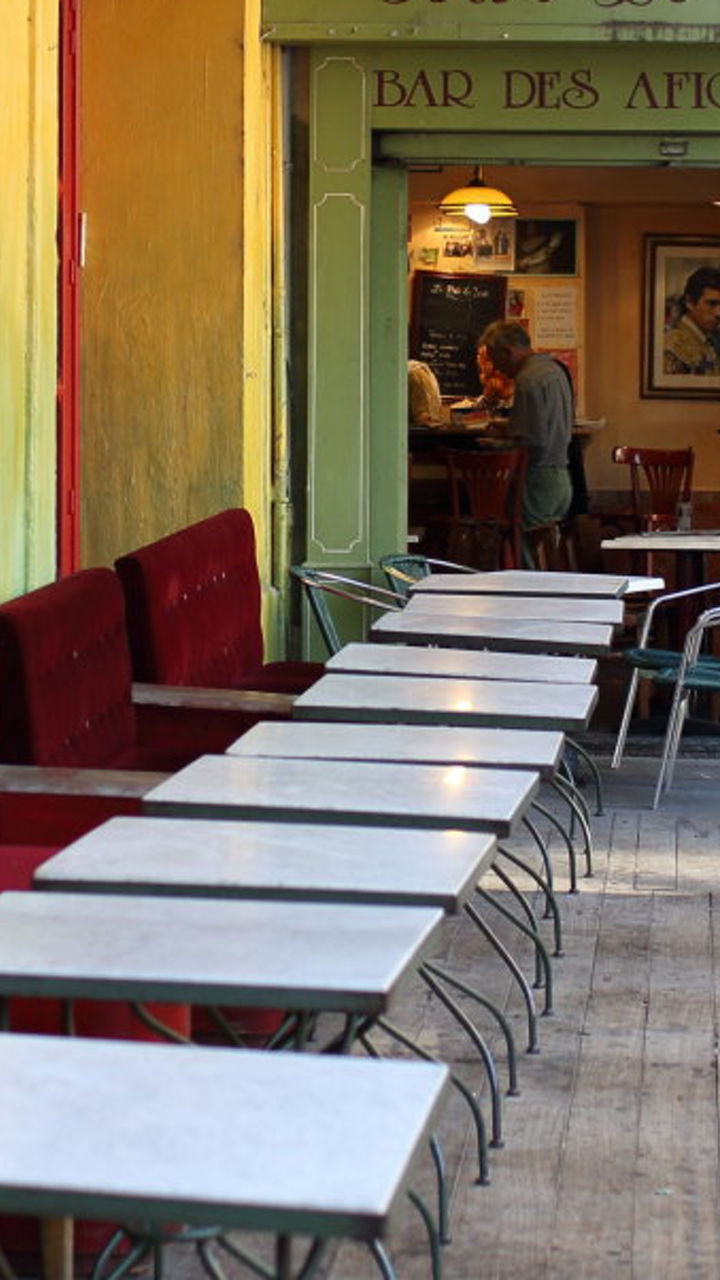 Outdoor café with red seating in France