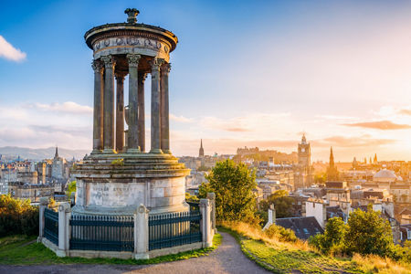 Historic monument overlooking Edinburgh cityscape