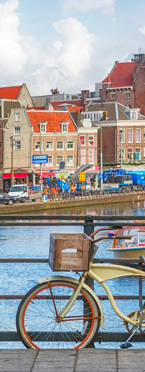 Scenic Amsterdam canal with bicycles
