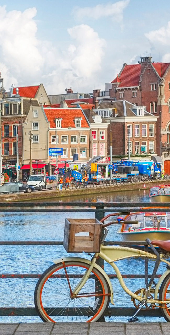 Scenic Amsterdam canal with bicycles