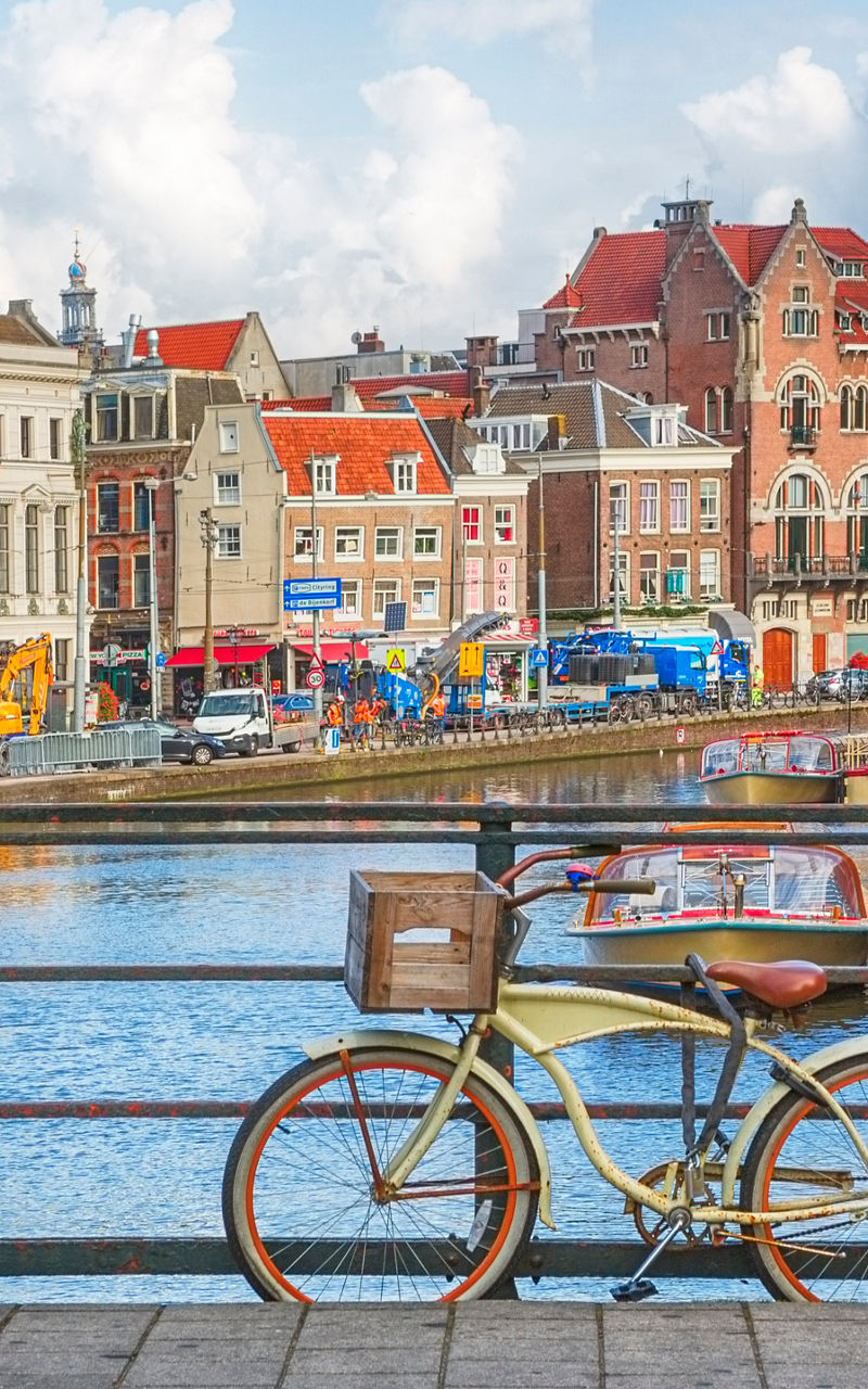 Scenic Amsterdam canal with bicycles