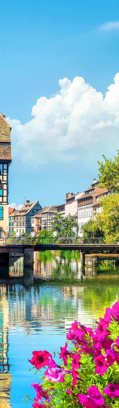 Scenic canal with historic timber houses