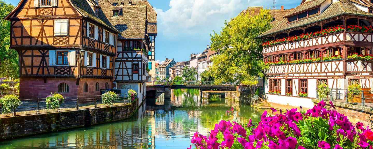 Scenic canal with historic timber houses
