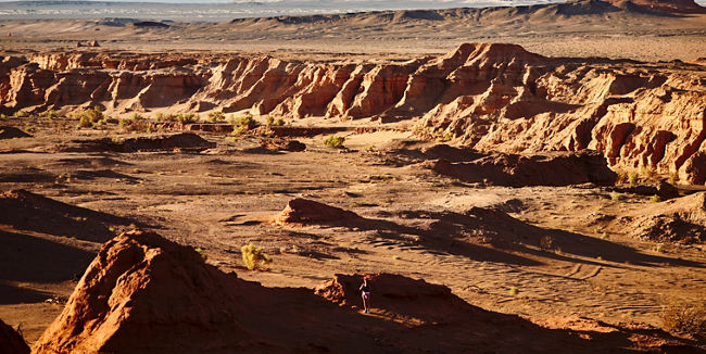 Expansive desert landscape with rocky formations