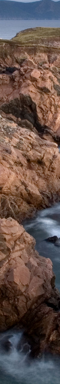 Rocky coastal cliffs at sunset