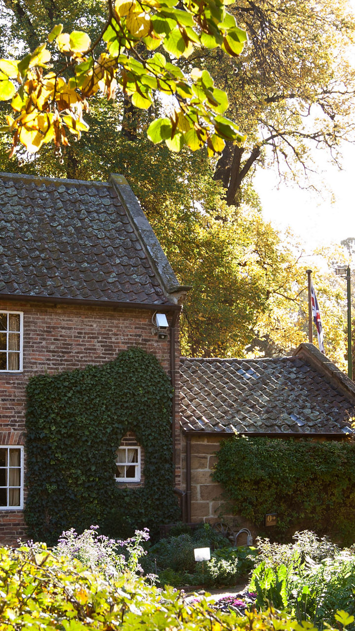 Charming brick cottage in lush garden setting