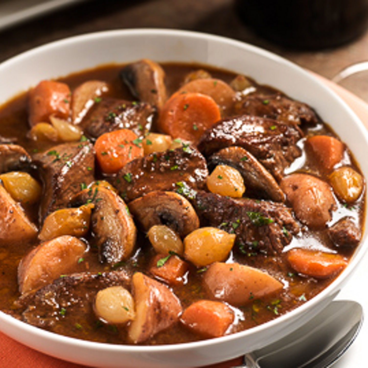 Hearty beef stew with vegetables and wine