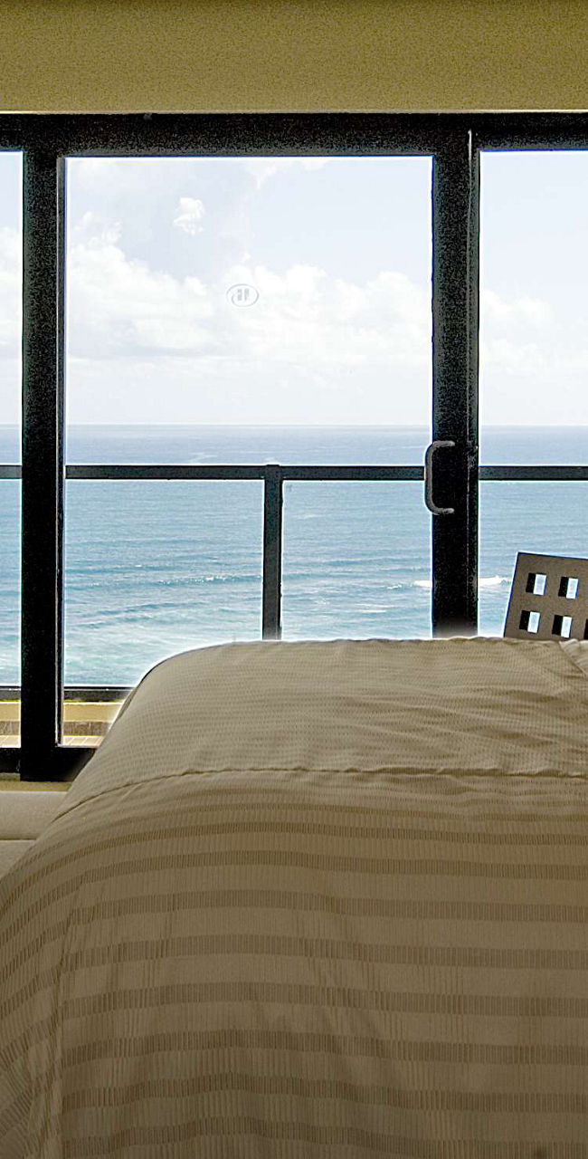 Oceanfront bedroom with modern decor