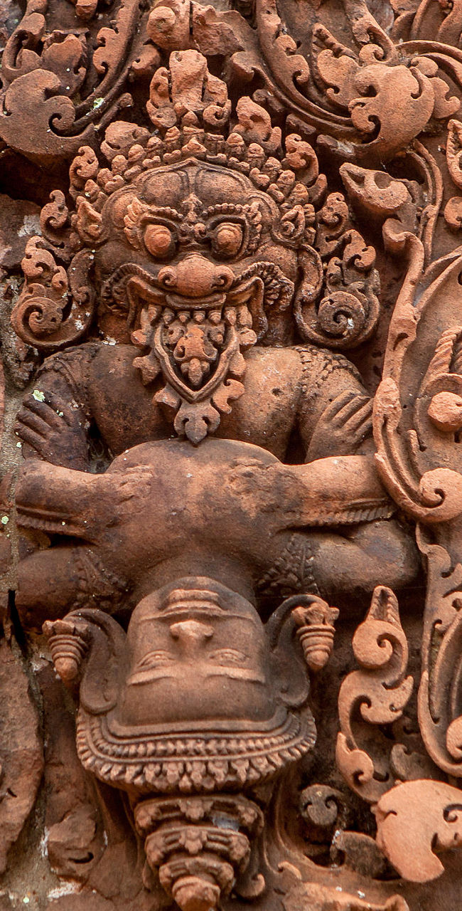 Intricate stone carving of Hindu deity