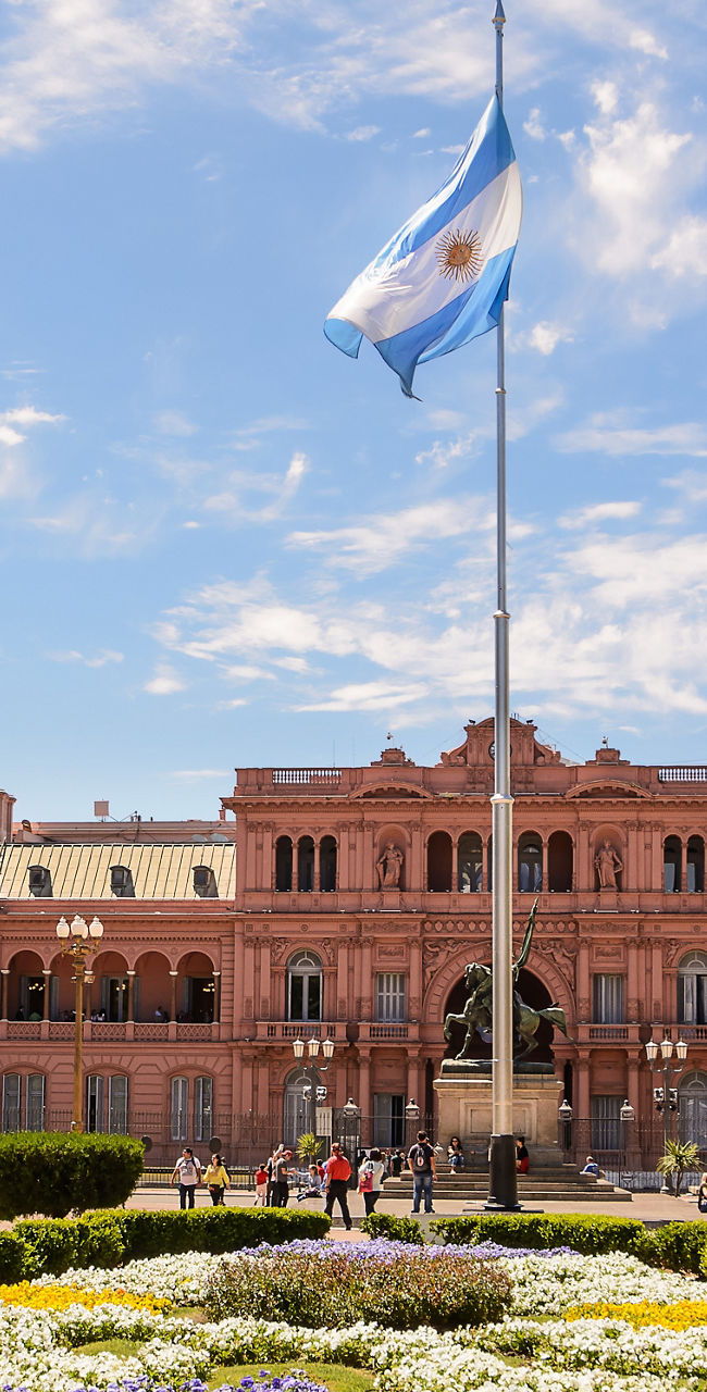 Casa Rosada with Argentine flag in plaza