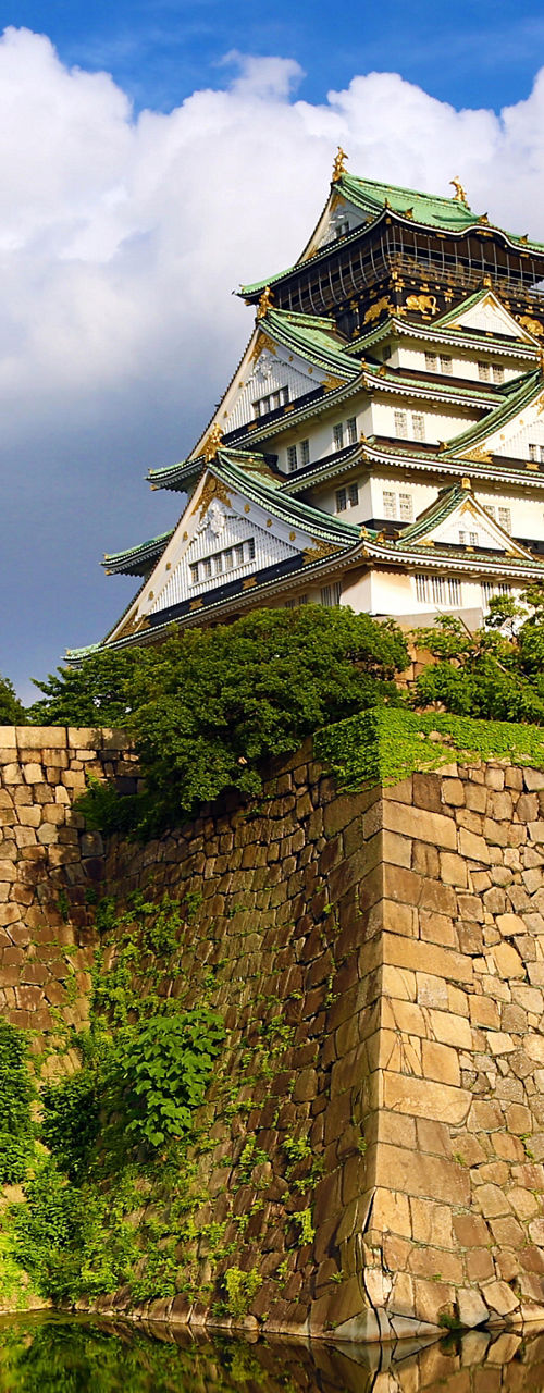 Osaka Castle with reflection in moat