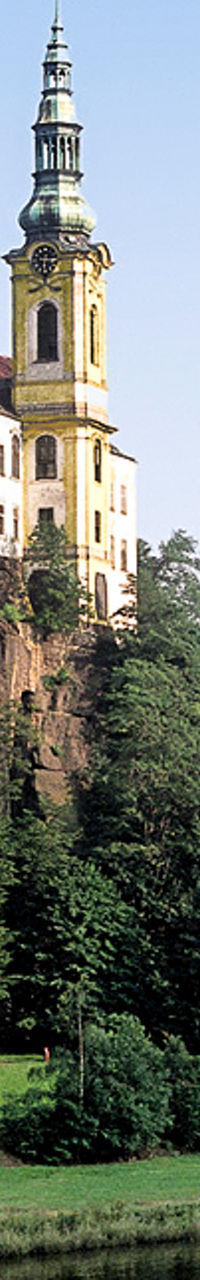Historic riverside monastery with scenic view