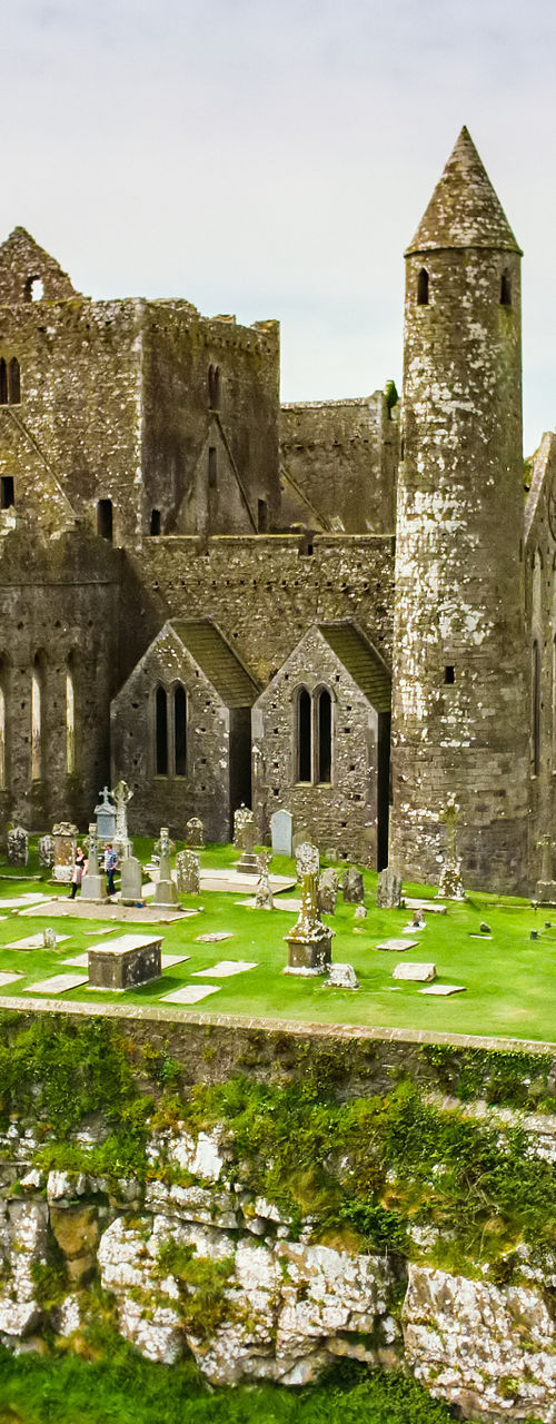 Historic Rock of Cashel in lush Irish landscape