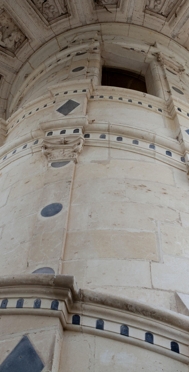 Ornate stone tower interior with carvings