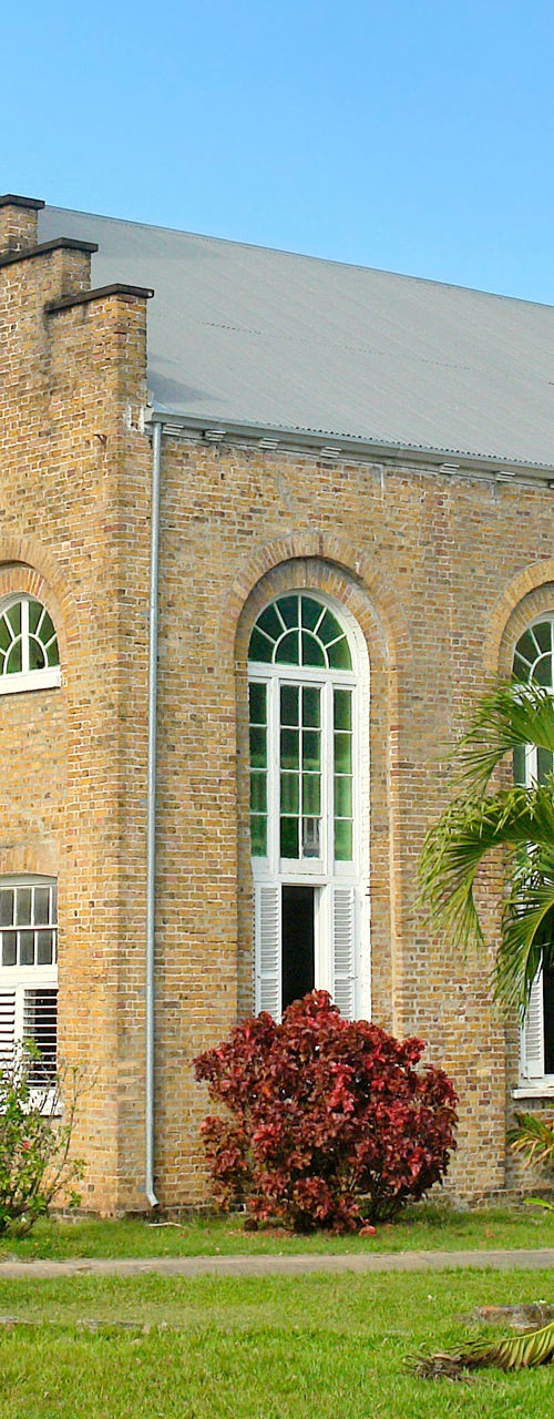 Historic brick church with arched windows