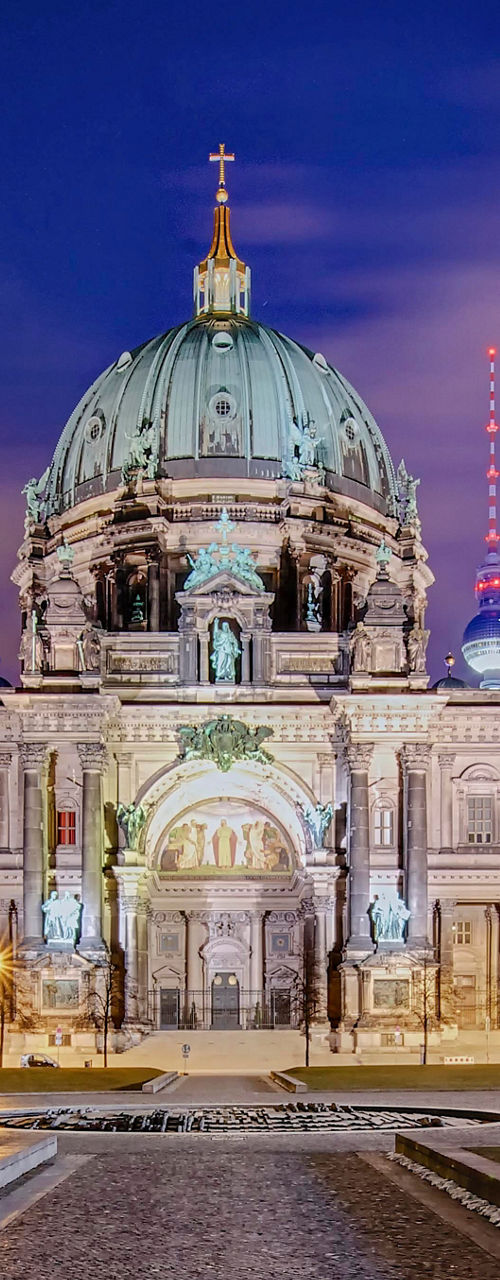 Berlin Cathedral at night with vibrant lights