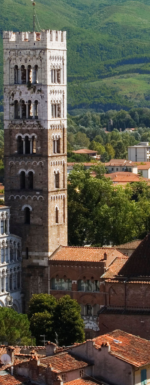 Historic Italian cityscape with mountains