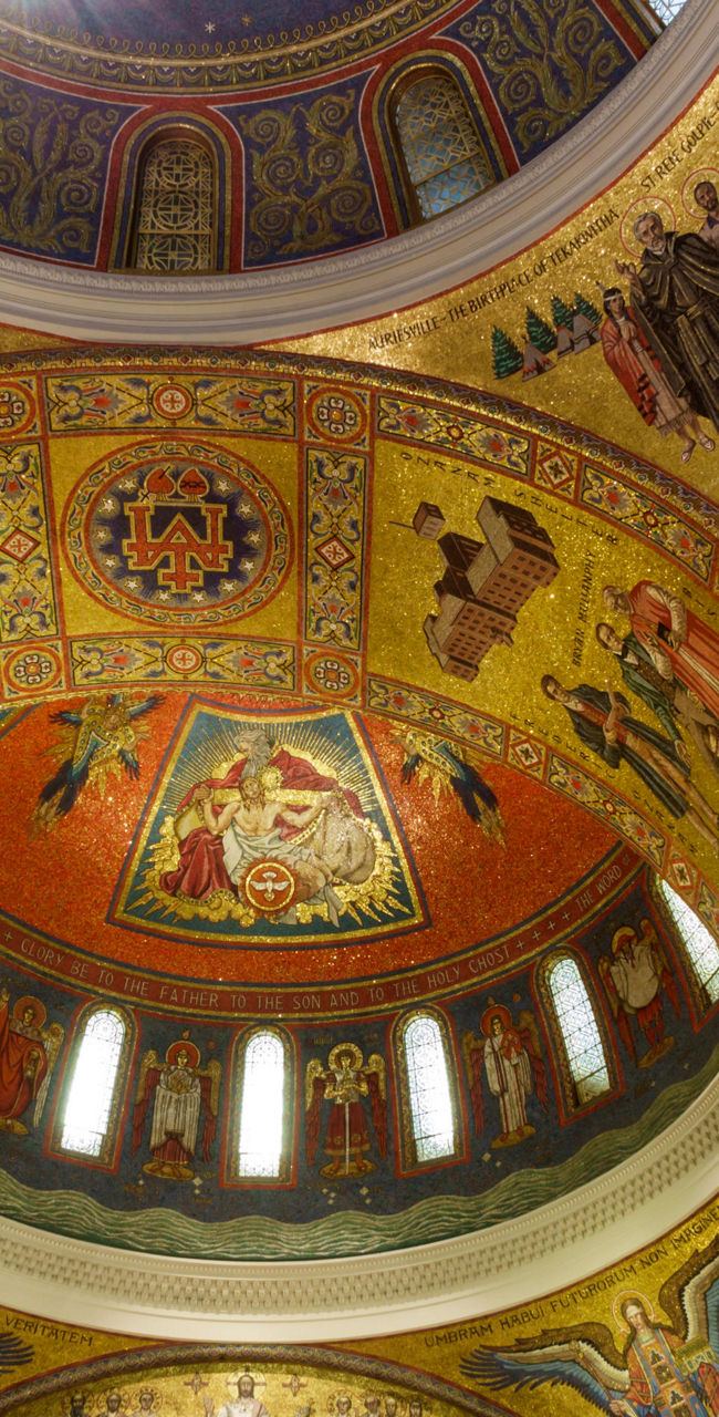 Ornate cathedral ceiling with golden mosaics