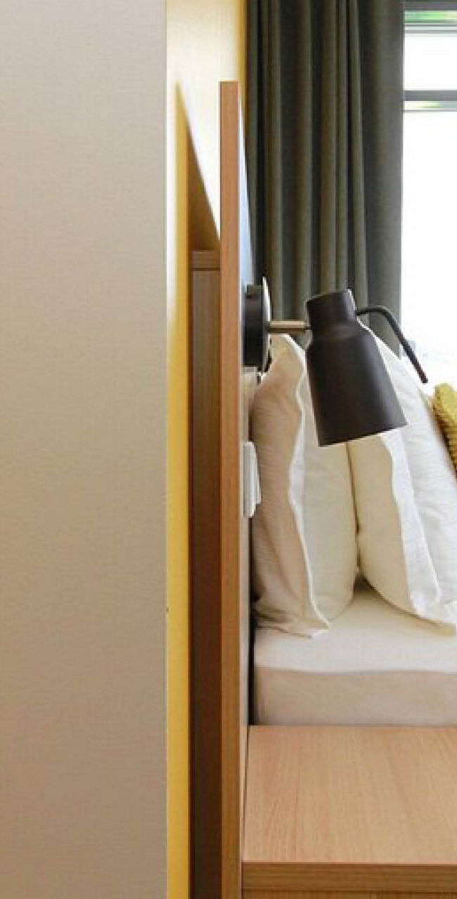 Modern hotel room with ensuite bathroom