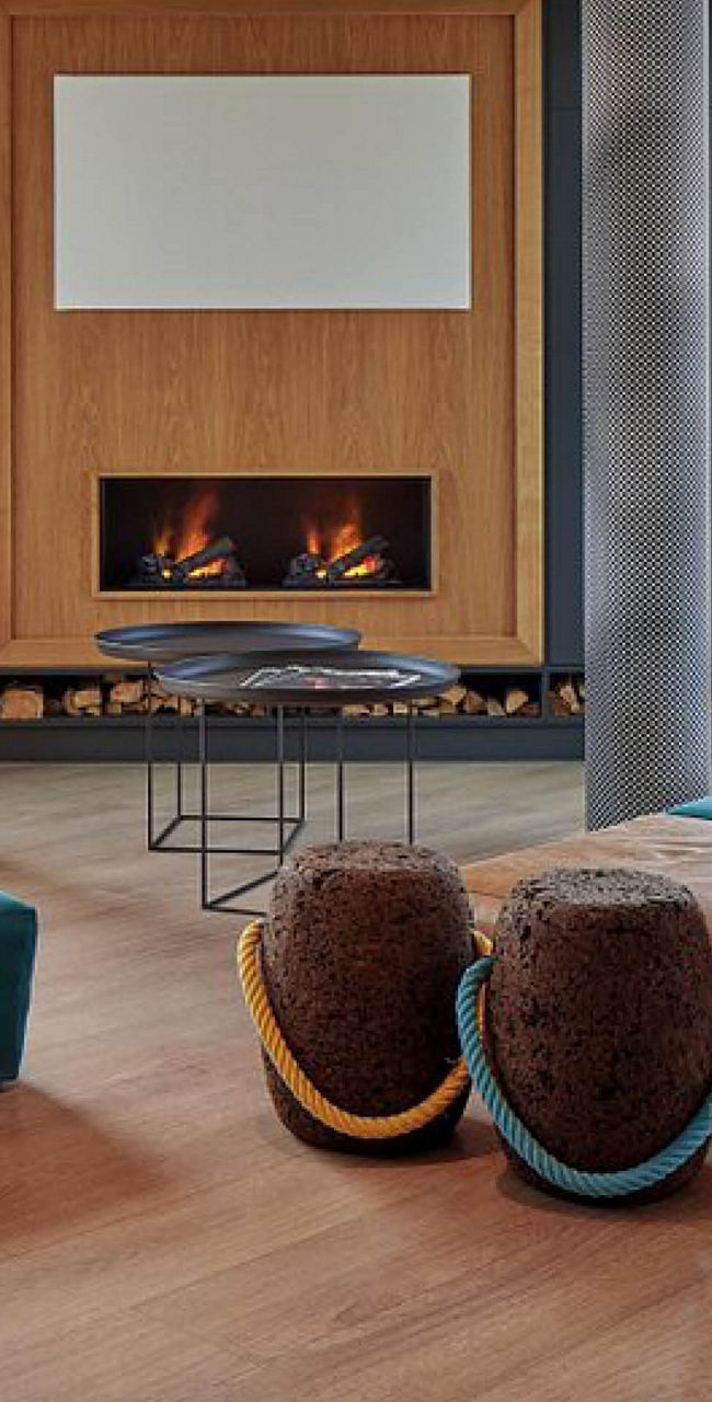 Modern lounge with fireplace and seating