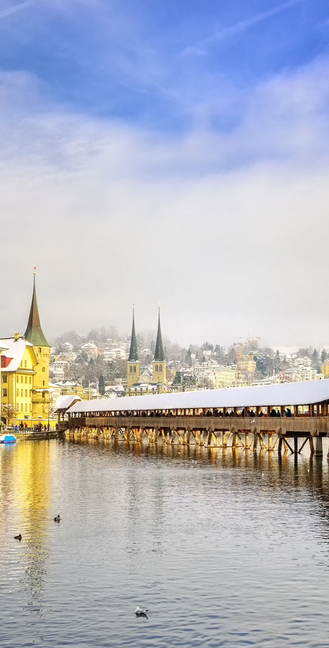 Snow-covered Chapel Bridge in Lucerne, Switzerland