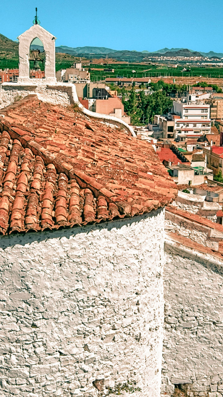 Historic Mediterranean town with red rooftops