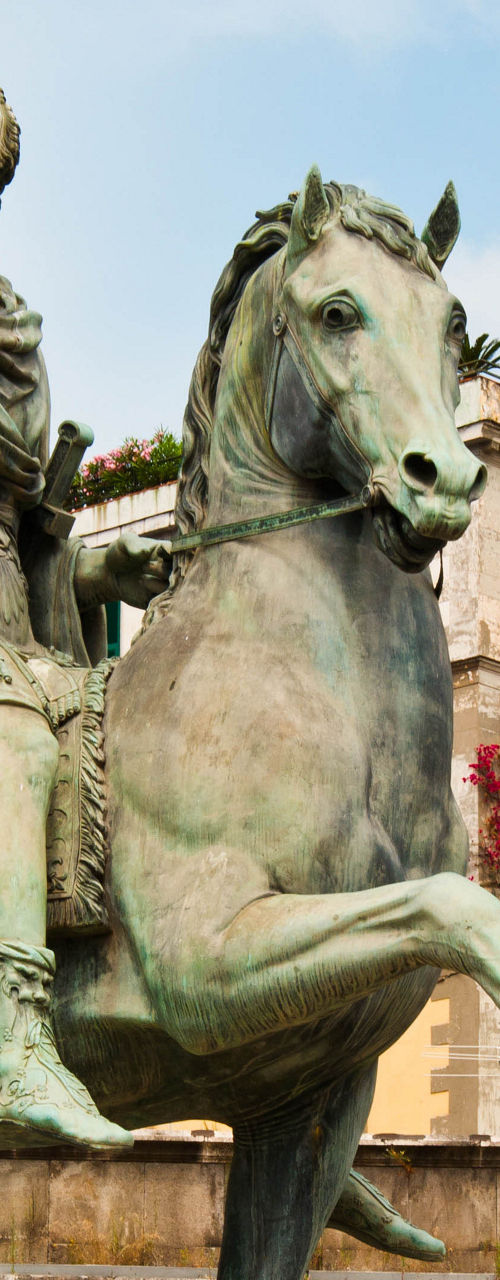 Equestrian statue in historic urban square