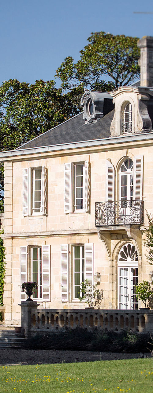 Elegant French estate with garden statue