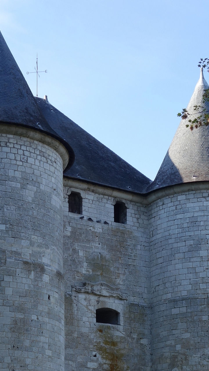 Historic stone castle with round towers