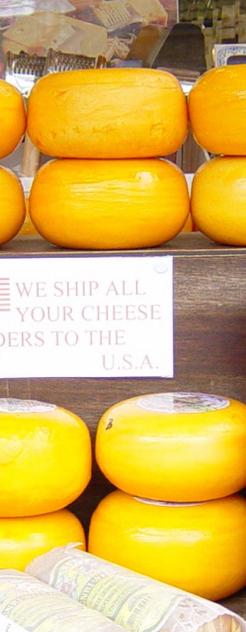 Colorful cheese display at storefront