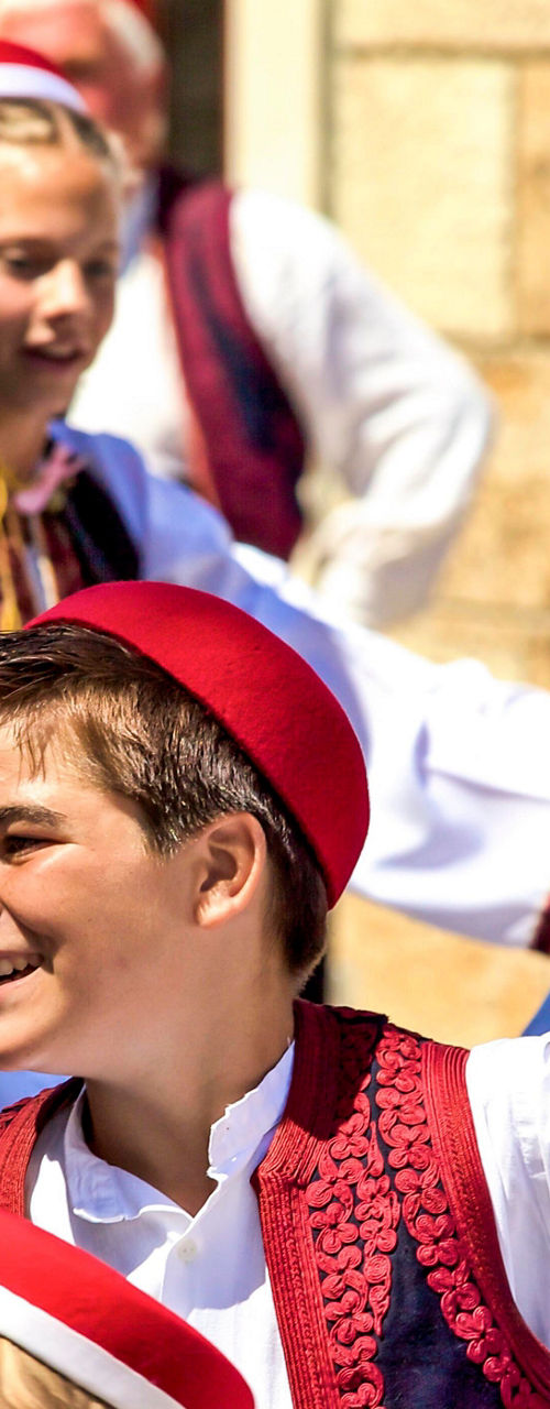 Traditional folk dancers in vibrant costumes