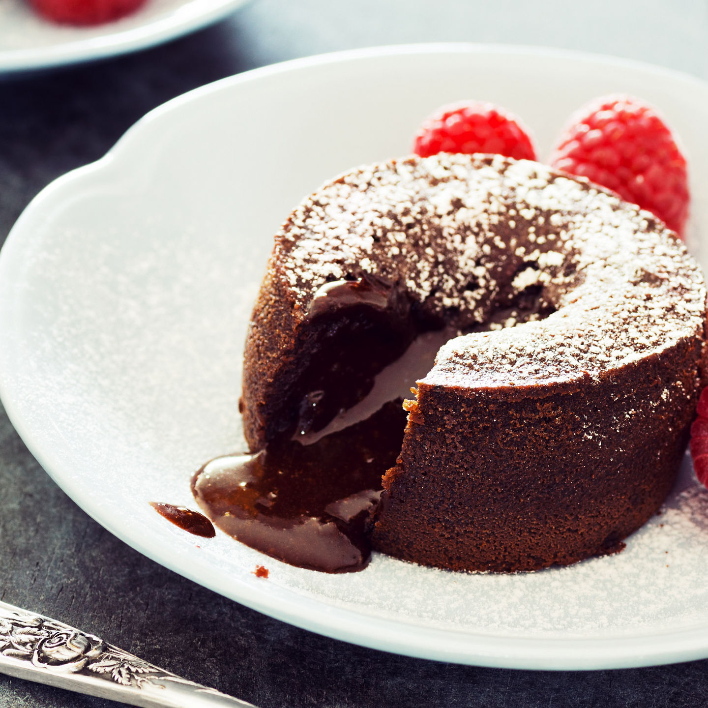 Chocolate lava cake with fresh raspberries