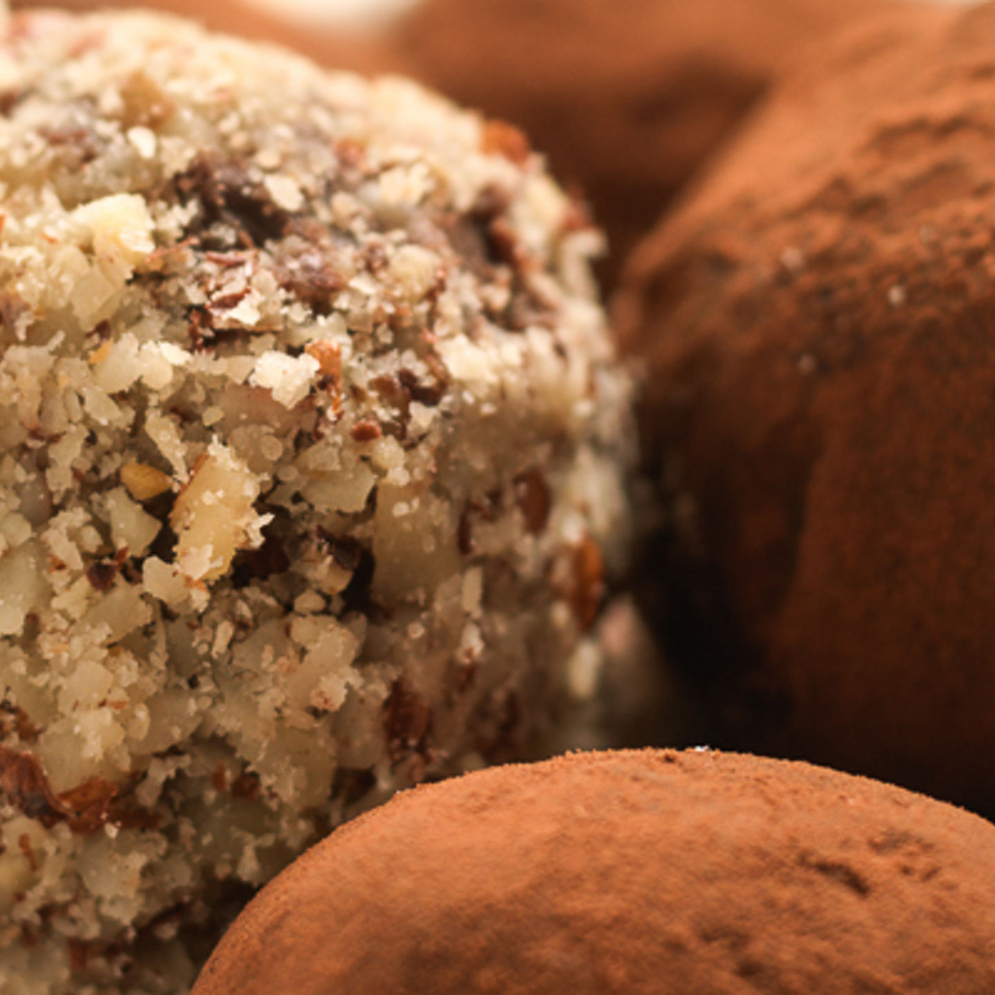 Assorted chocolate truffles in white bowl