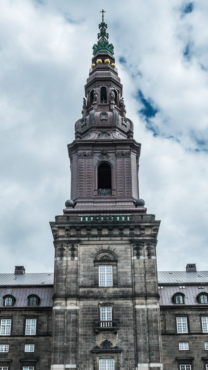 Historic building with ornate gates and tower