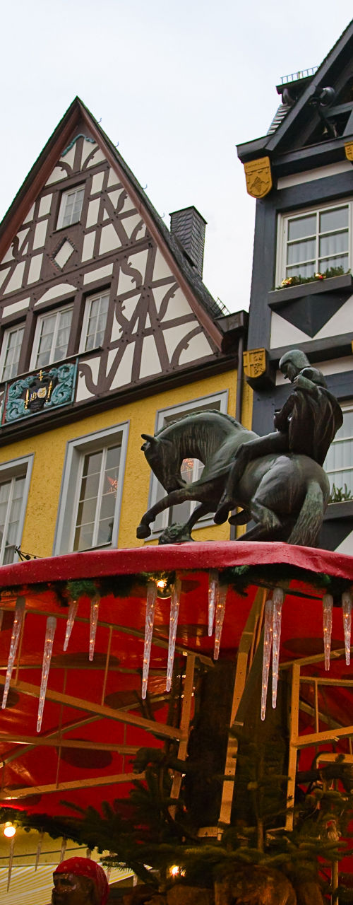 Festive carousel in European town square