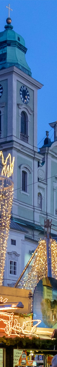 Festive Christmas Market with Illuminated Stalls