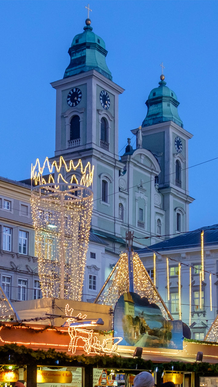 Festive Christmas Market with Illuminated Stalls