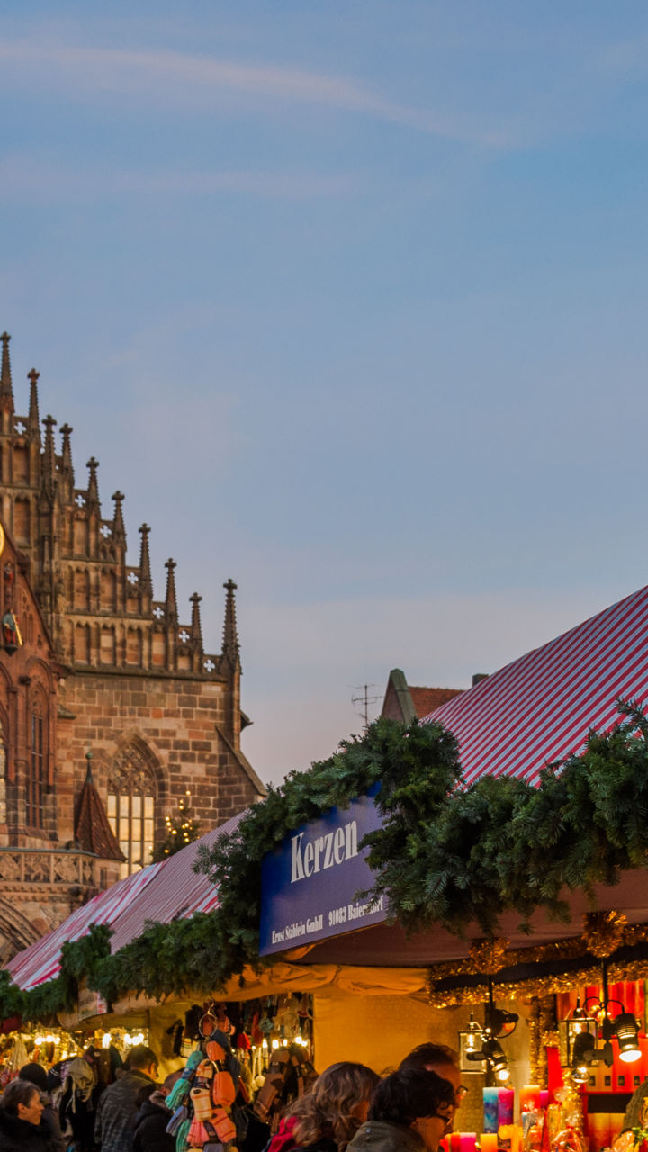 Festive Christmas market with church backdrop