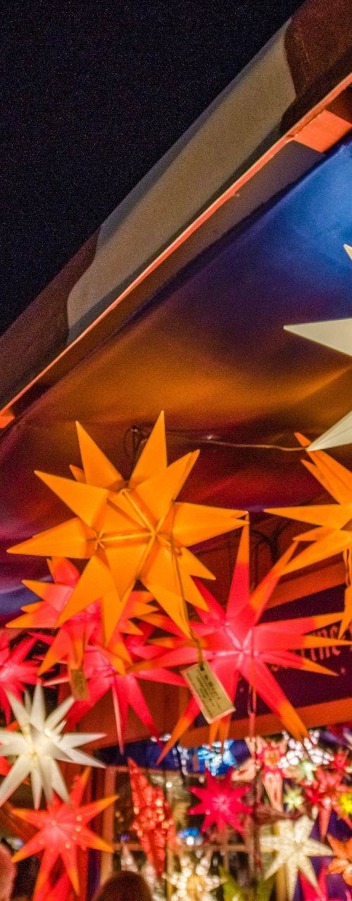 Colorful star lanterns at night market